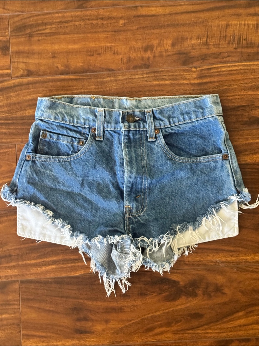 Levi's Medium Blue Frayed Denim Cutoff Shorts